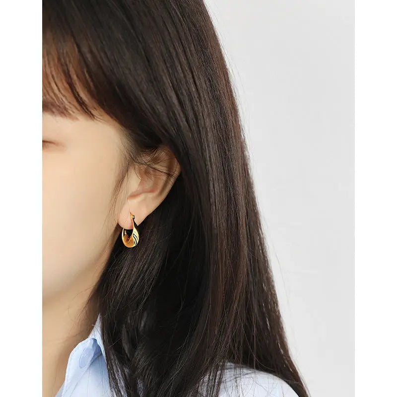 TWISTED SILVER EARRINGS - OPHRASTUDIO