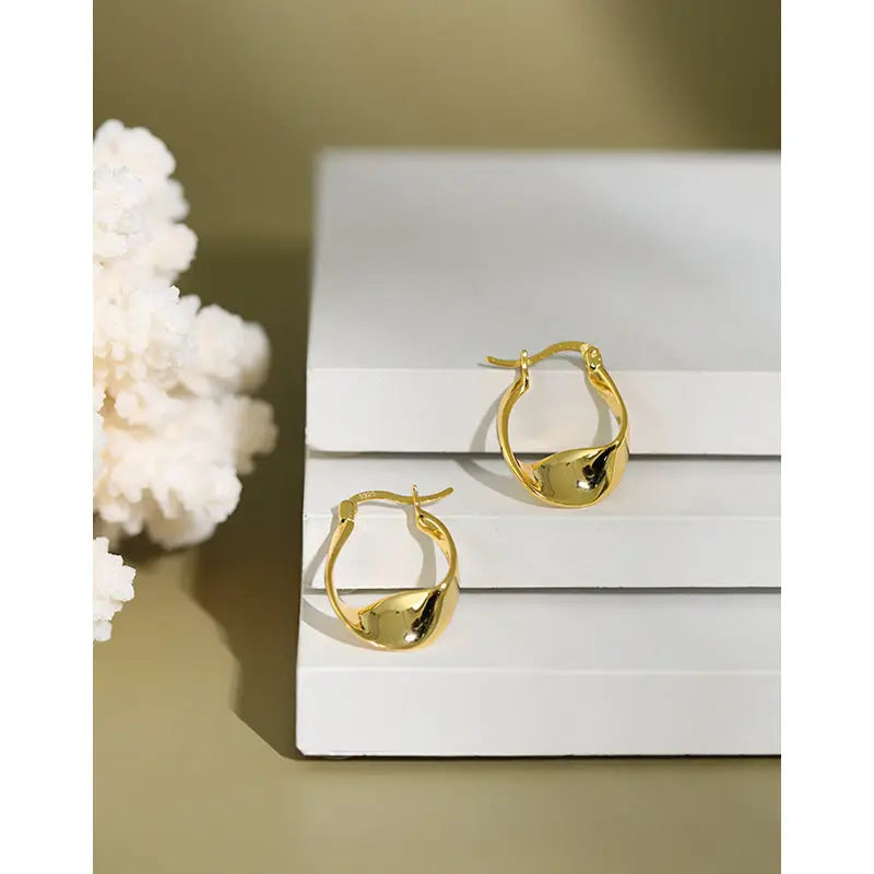 TWISTED SILVER EARRINGS - OPHRASTUDIO