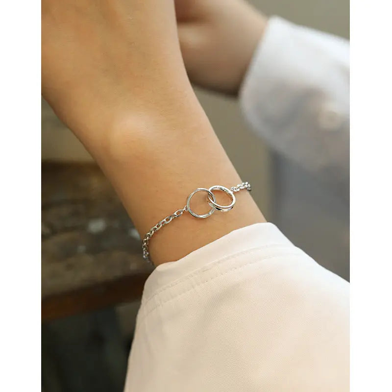 CASSANDRA'S DOUBLE CIRCLE RING SILVER BRACELET - OPHRASTUDIO