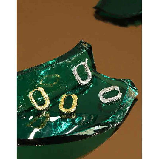 Oval Textured Silver Huggie Earrings