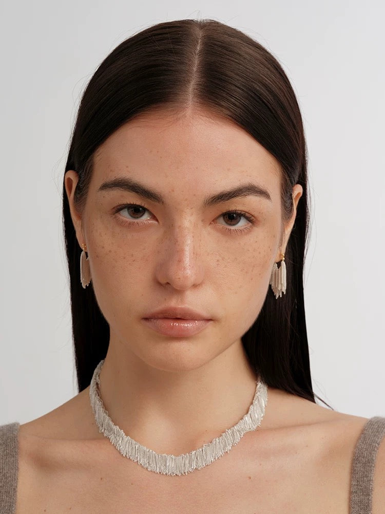 Whisper Tassel Earrings Lightweight elegance with a whisper of motion. These earrings feature fine tassel chains that sway gently with every step — effortless, graceful, unforgettable OPHRASTUDIO
