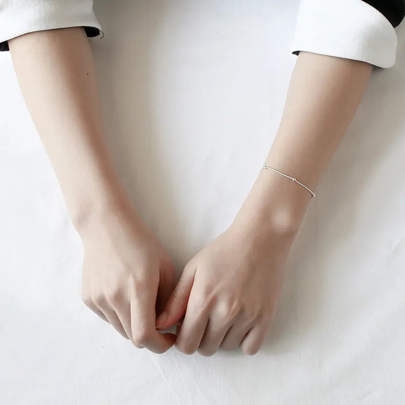 ATHENA'S ROUND BEAD SNAKE BONE SILVER BRACELET - OPHRASTUDIO