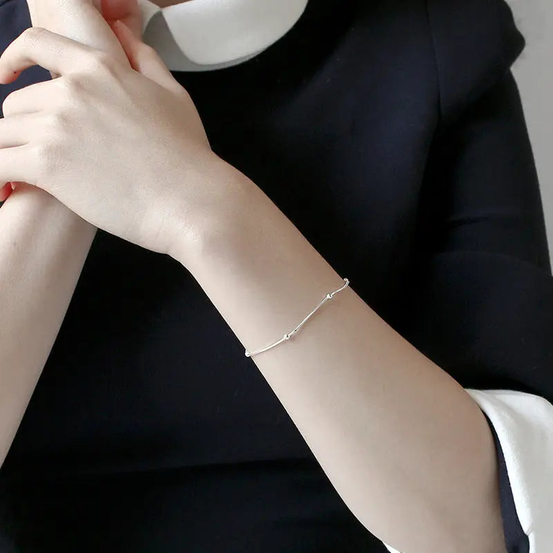 ATHENA'S ROUND BEAD SNAKE BONE SILVER BRACELET - OPHRASTUDIO