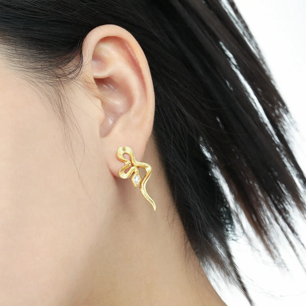 MEDEA'S SERPENTINE ZIRCON SILVER EAR STUDS - OPHRASTUDIO