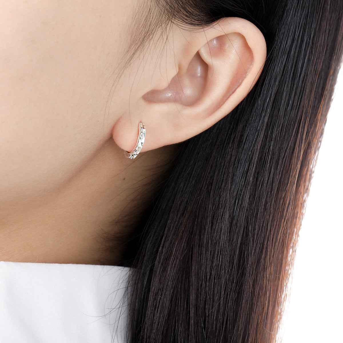 Elsa's Elegance Silver Huggie Earrings