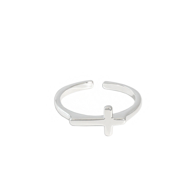 SLEEK SILVER CROSS RING OPHRASTUDIO