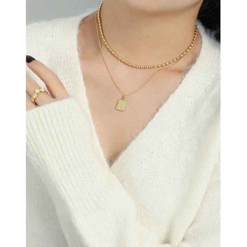 Athena's Geometric Embossed Silver Pendant Necklace
