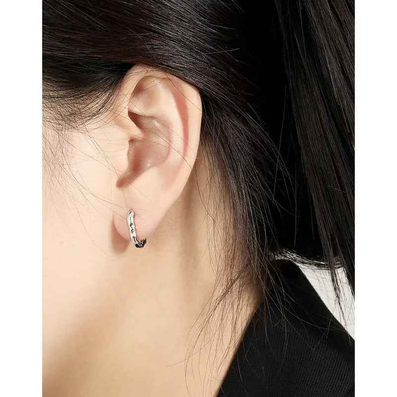 Serene Contours Silver Huggie Earrings
