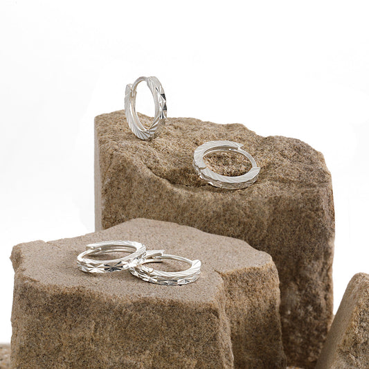 Elsa's Elegance Silver Huggie Earrings