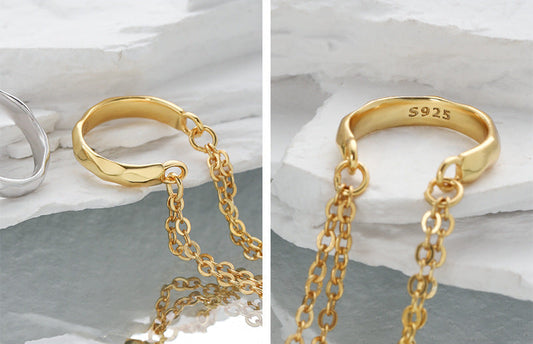 Orecchino a polsino con nappa a catena lunga