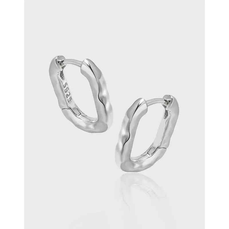Serene Contours Silver Huggie Earrings