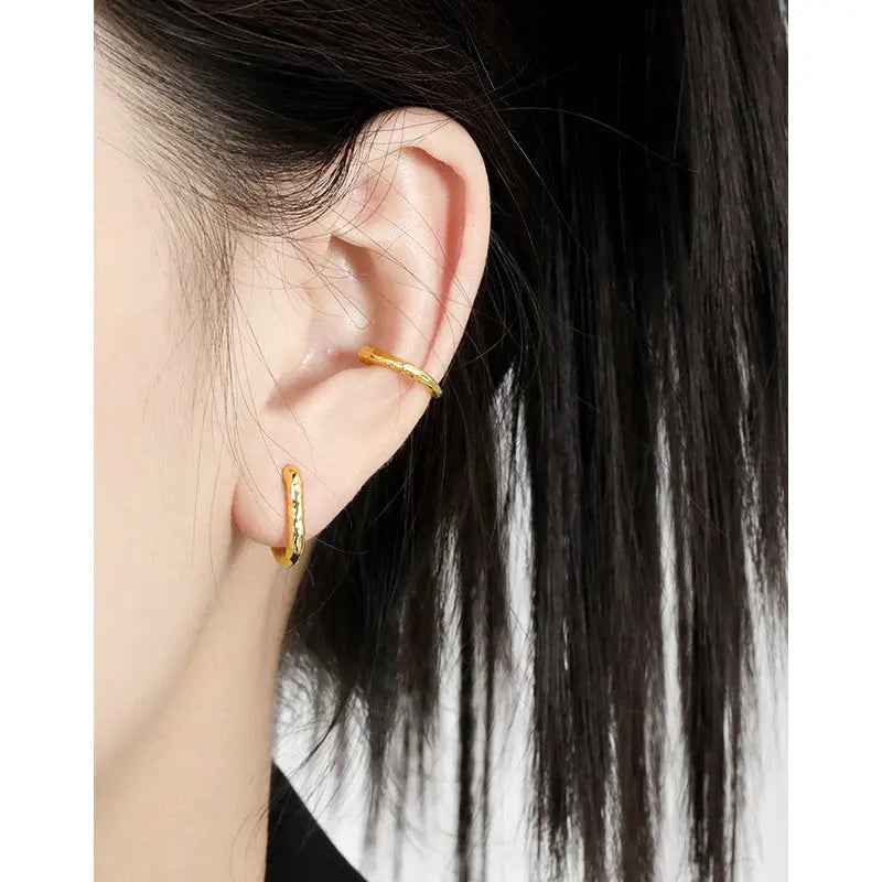 Serene Contours Silver Huggie Earrings