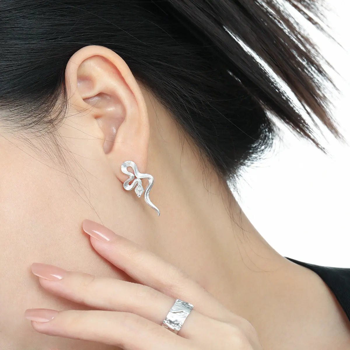 MEDEA'S SERPENTINE ZIRCON SILVER EAR STUDS - OPHRASTUDIO