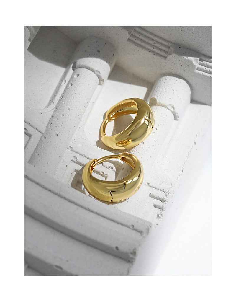 Isabella's Geometric Circle Silver Huggie Earrings