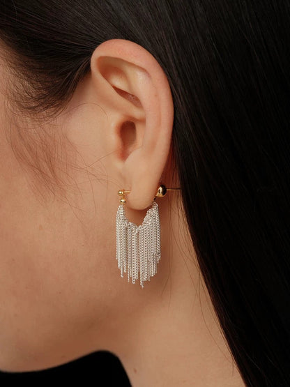 Whisper Tassel Earrings Lightweight elegance with a whisper of motion. These earrings feature fine tassel chains that sway gently with every step — effortless, graceful, unforgettable OPHRASTUDIO