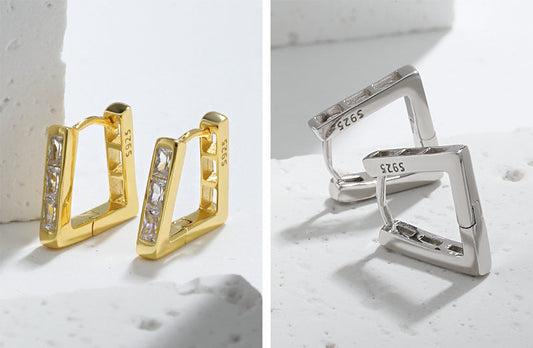 Orecchini a cerchio con zirconi trapezoidali geometrici