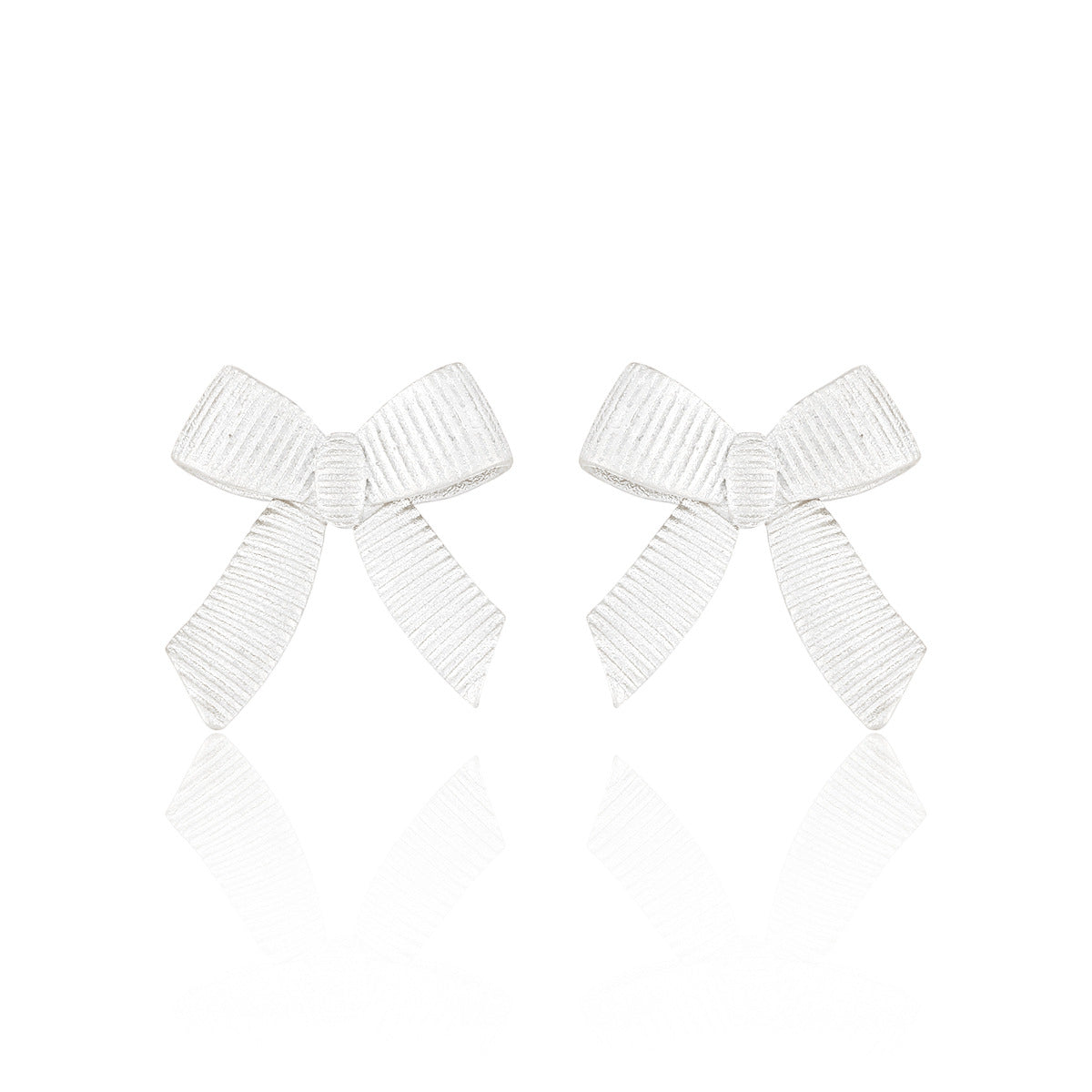 Ribbon Whisper Textured Bow Silver Stud Earrings OPHRASTUDIO