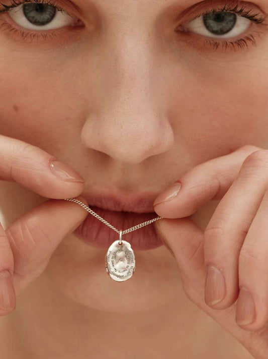 Faces Unveiled Silver Engraved Necklace